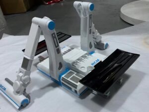SLA 3D Printed Machine with Robotic Arms as Student Project