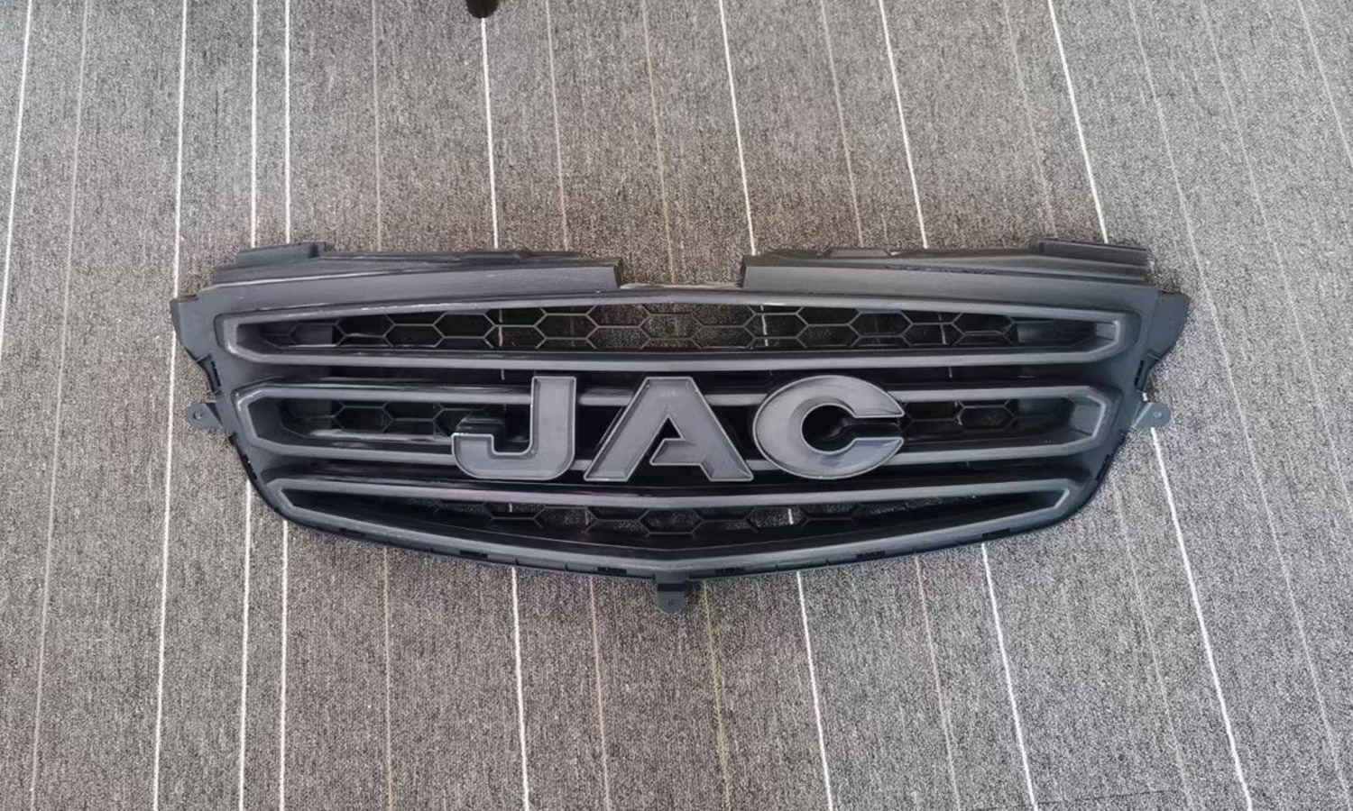 Urethane Cast and Vacuum Plated JAC Vehicle Grille using ABSlike Resin