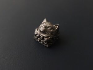 Dog Keycaps Made with DMLS Titanium 3D Printing, Brass Casting and Silver Electroplating