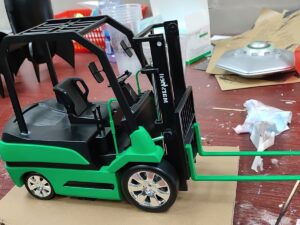 SLA 3D Printed Scaled-down Forklift Model as Student’s Project