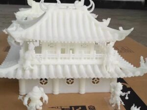 SLA 3D Printed White Resin Architecture and Characters Garage Kits in a Game