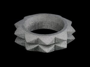 BinderJet 3D Printed SS316L Ring with Triangular Facets